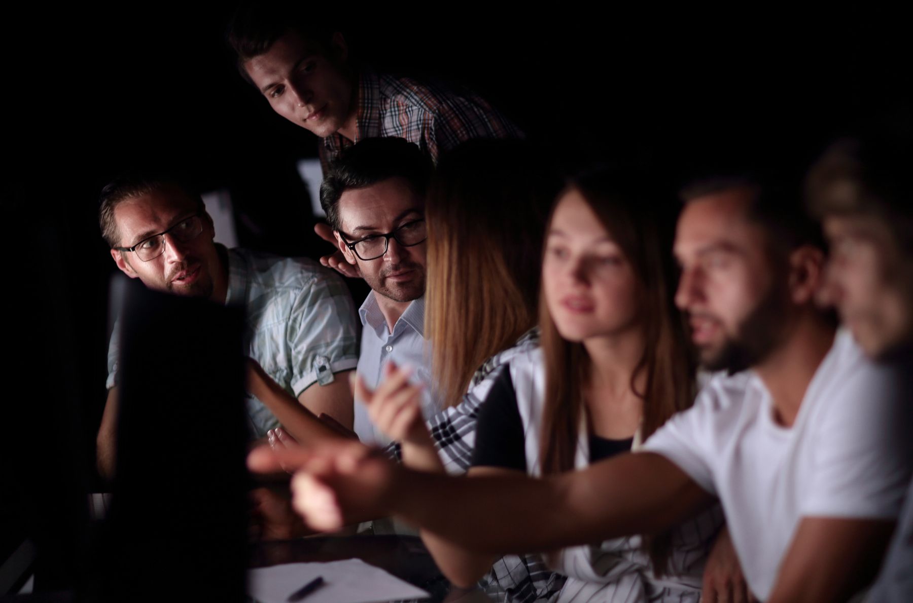 EP Digital creative and marketing team collaborating around a screen